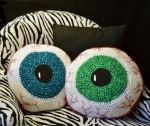 Crocheted eyeball pillow. Perfect pattern for teens and Halloween decorating.