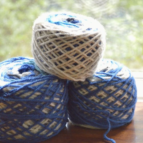 magic balls of yarn made with scraps to be used for crocheting a lapghan for donation